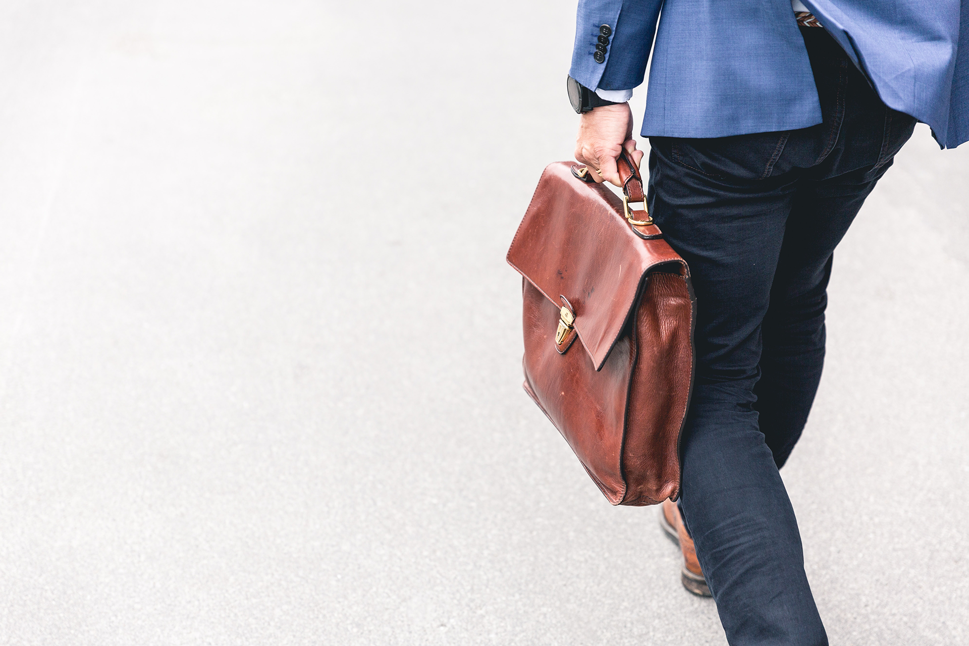 man-walking-with-briefcase