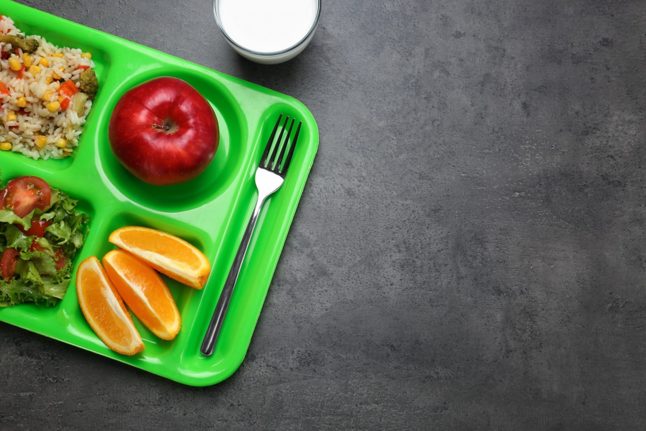 Serving tray with delicious food on table. Concept of school lunch